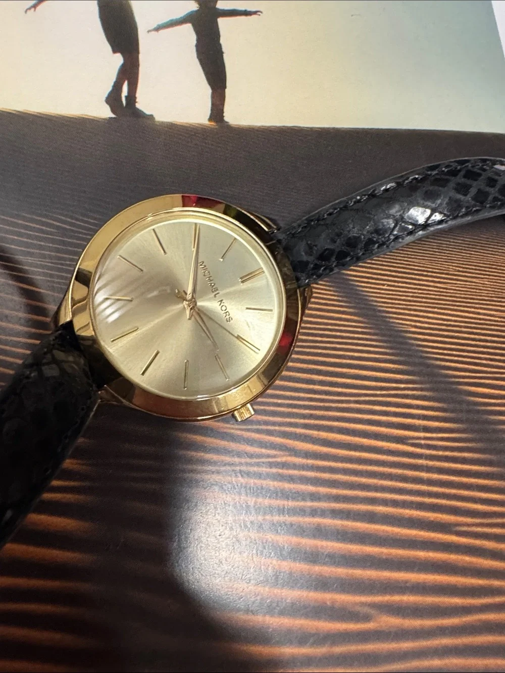 Classic Gold Dial women’s Watch with Black Leather Strap